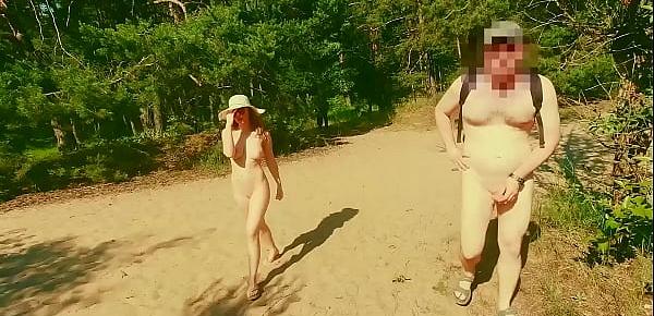 trendsA nudist girl walks in forest near the beach among dressed people. (Emerald Ocean)